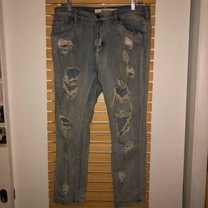 Ripped boyfriend jeans.